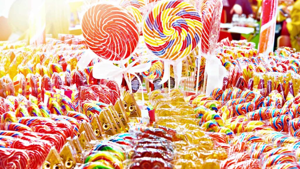 Colourful lollipops and candy on display masthead banner