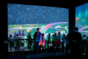 Kagiso Children playing with the interactive screen at Future Park, Silverstar