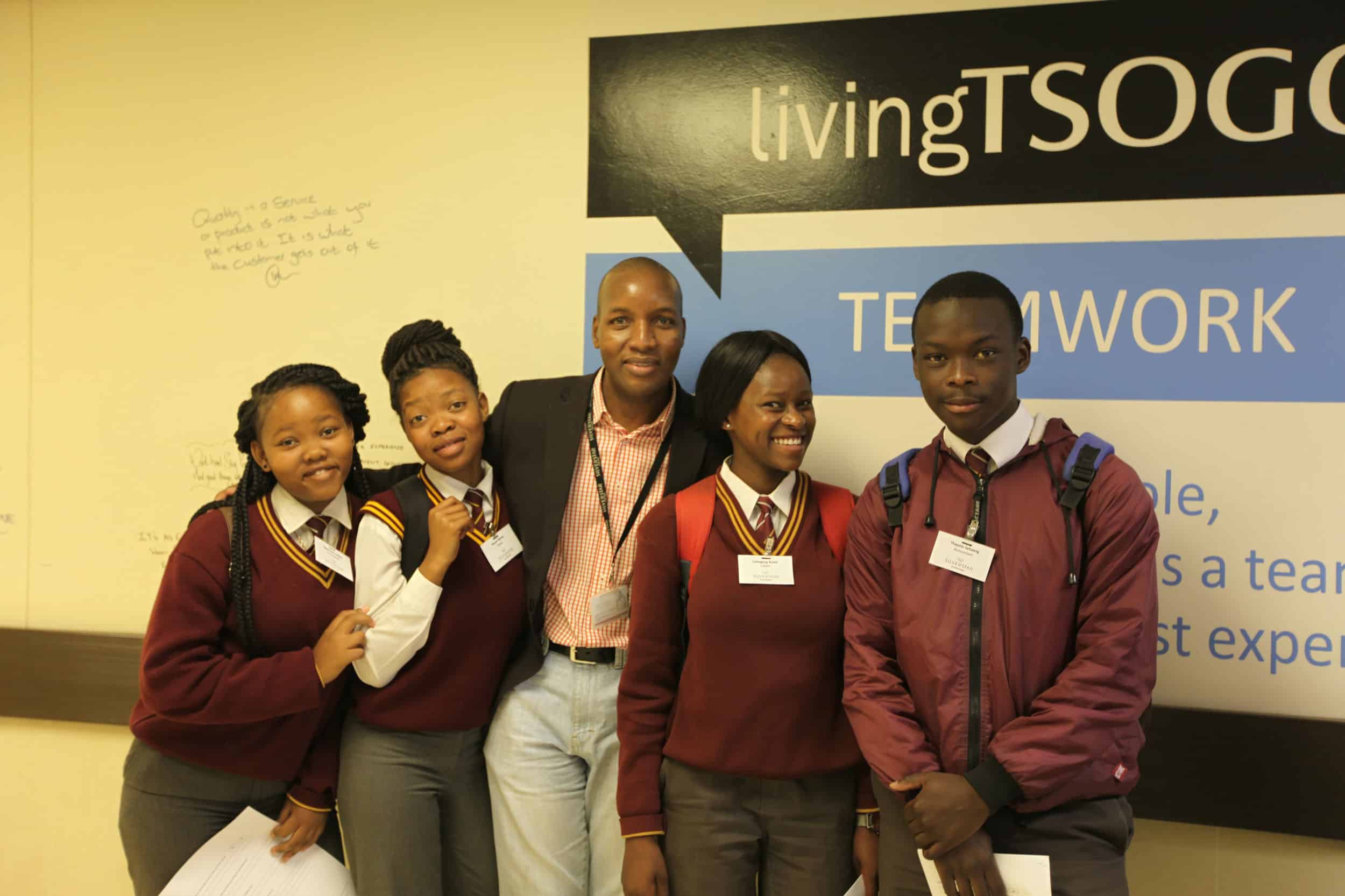 Patrick Mungani, Financial Accountant at Silverstar Casino, with students from Mosupatsela Secondary School in Kagiso.